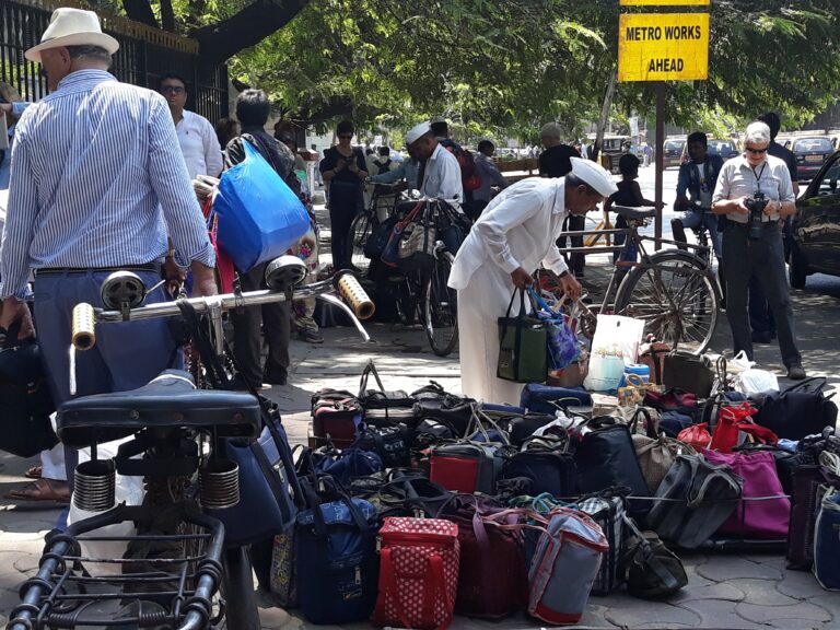 Dabbawalas and local trains on a Mumbai public transport tour