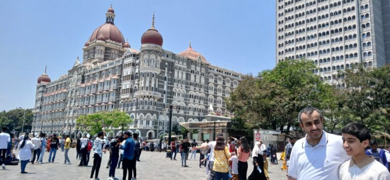 the Taj Hotel by Gateway of India on full day sightseeing with slum visit - Mumbai Experiences