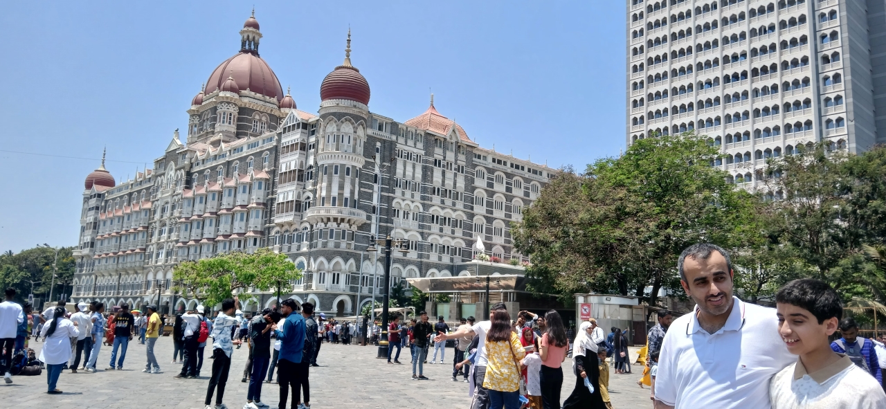 the Taj Hotel by Gateway of India on full day sightseeing with slum visit - Mumbai Experiences
