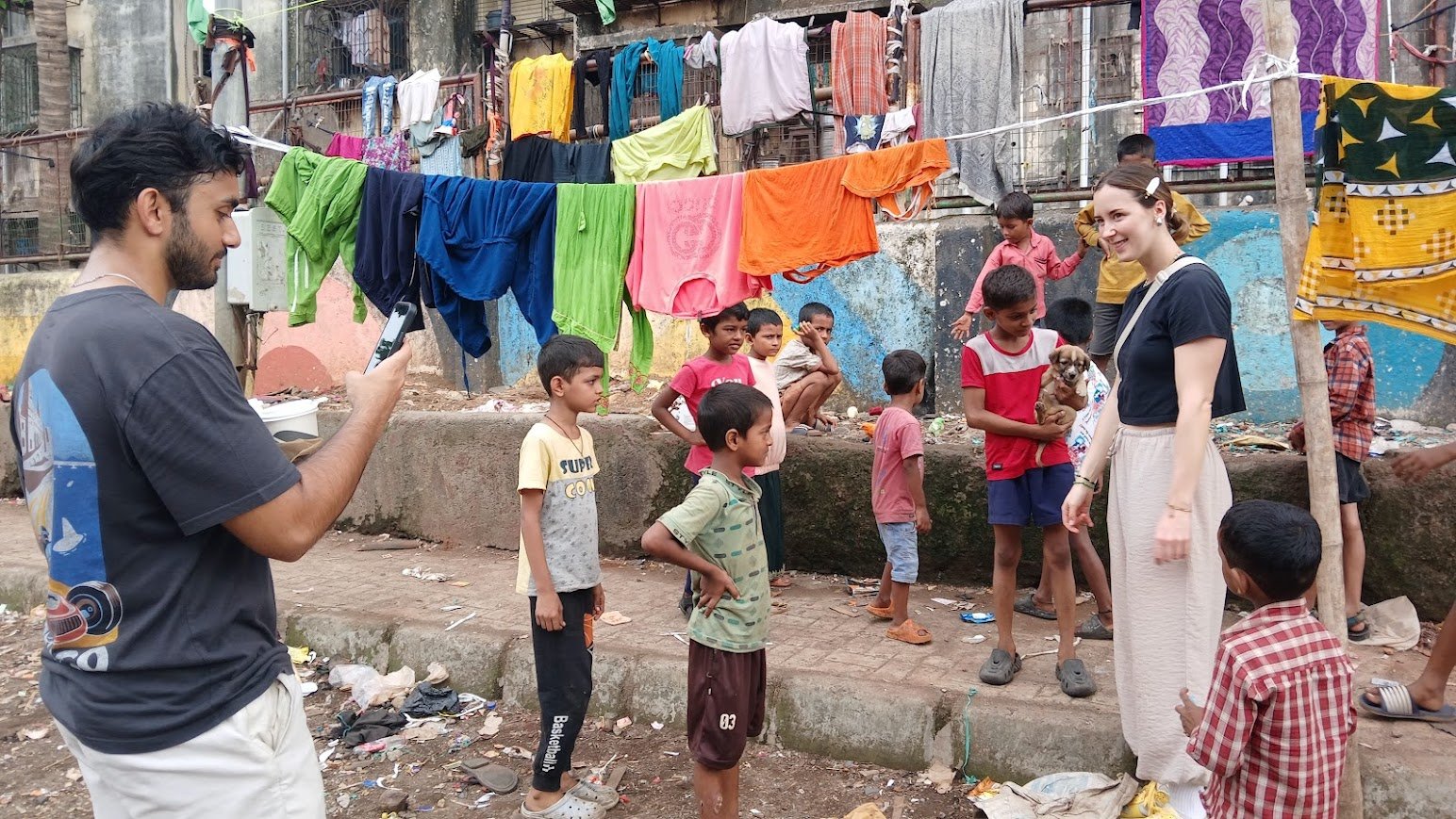 Visitors walking through Dharavi in Mumbai