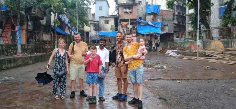 A family visiting Dharavi on an ethical guided tour
