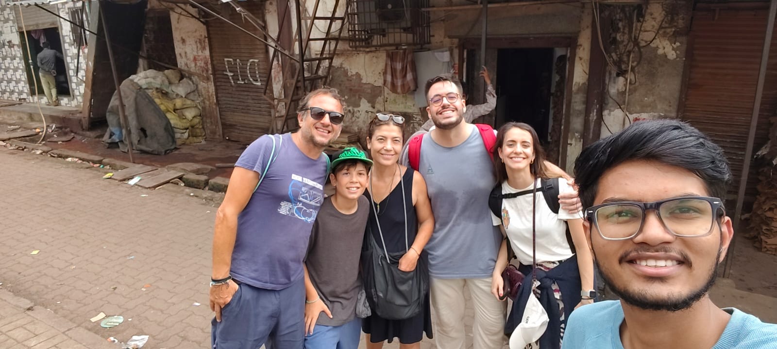 A Mumbai Experiences local guide leading guests through Dharavi