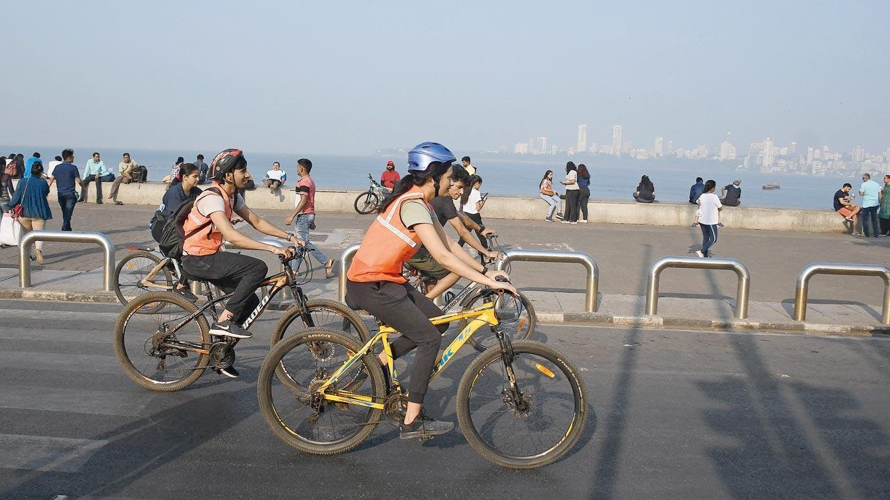 bicycle tour, riding at marine drive along the promenade