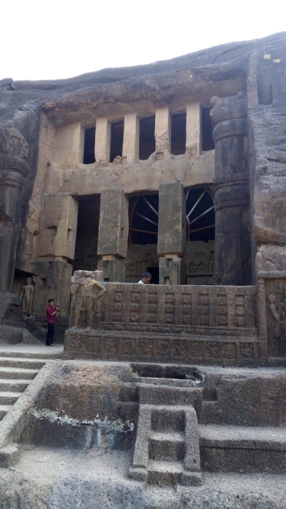 The rock-cut facade and entrance steps of Cave 3, the great prayer hall at Kanheri Caves, Mumbai